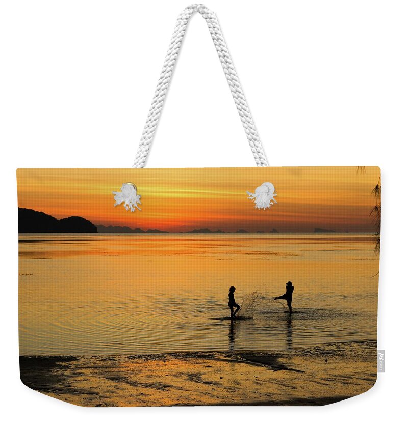 Childhood Weekender Tote Bag featuring the photograph Forever Young by Josu Ozkaritz