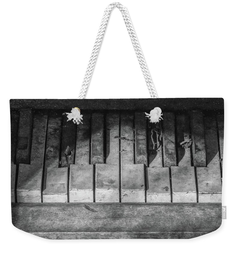 Music Weekender Tote Bag featuring the photograph Forgotten Keyboard BW by David Letts