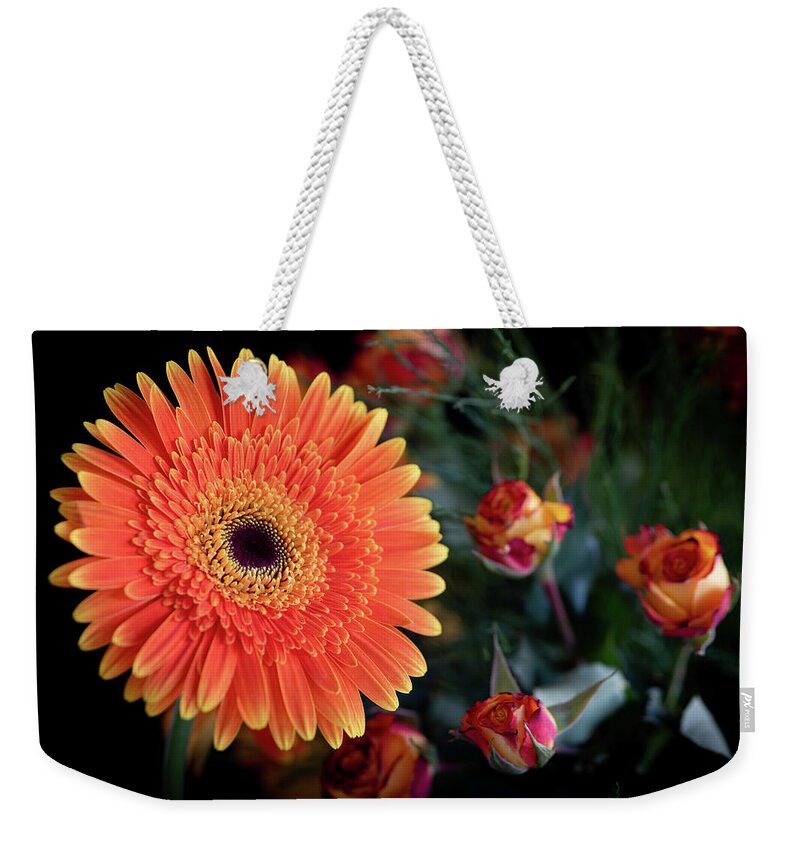 Daisies Weekender Tote Bag featuring the photograph Fresh beautiful orange daisy flower blossom. Blooming flower by Michalakis Ppalis