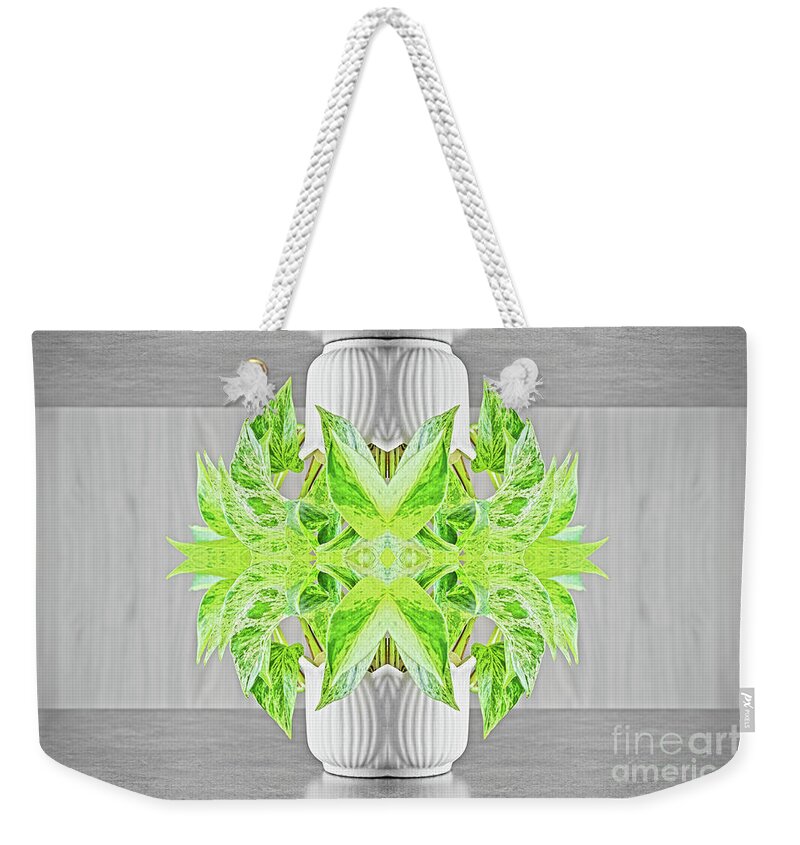 Surreal Weekender Tote Bag featuring the photograph Fresh green plant surreal shaped symmetrical kaleidoscope by Gregory DUBUS