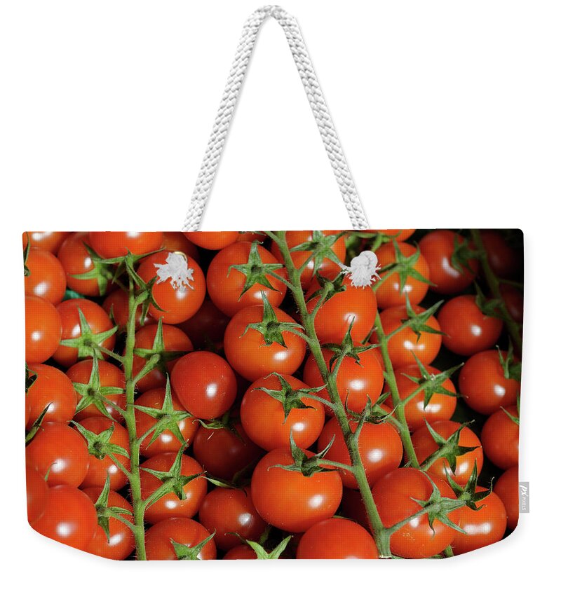 Market Weekender Tote Bag featuring the photograph Fresh vine tomatos at the Chatillon-sur-Loire Thursday market, Chatillon-sur-Loire, Centre, France by Kevin Oke