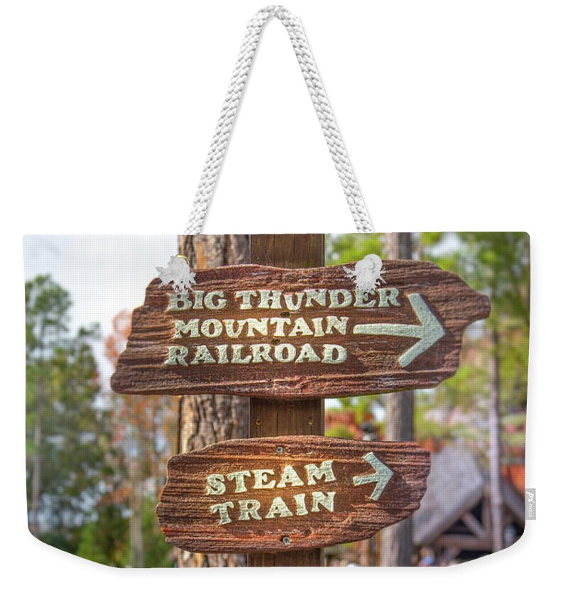 Magic Kingdom Weekender Tote Bag featuring the photograph Frontierland Sign by Mark Andrew Thomas