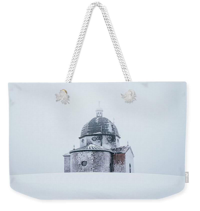 Radhost Weekender Tote Bag featuring the photograph Frozen historical chapel - White colour by Vaclav Sonnek