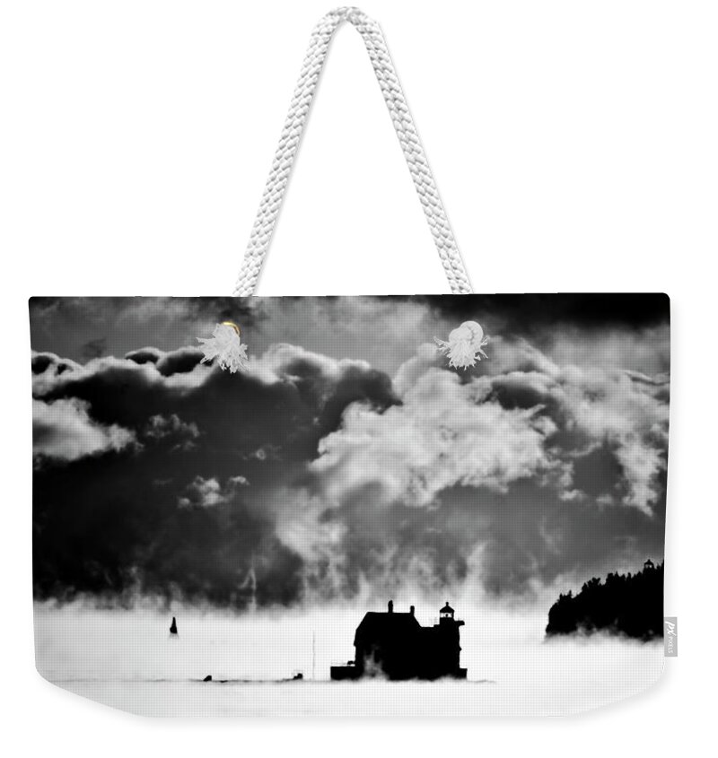 Breakwater Lighthouse Weekender Tote Bag featuring the photograph Frozen in Time by Jeff Cooper