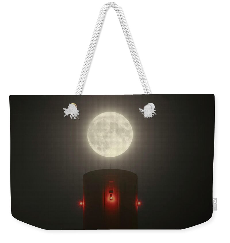  Weekender Tote Bag featuring the photograph Full moon cannon by Patrick Van Os