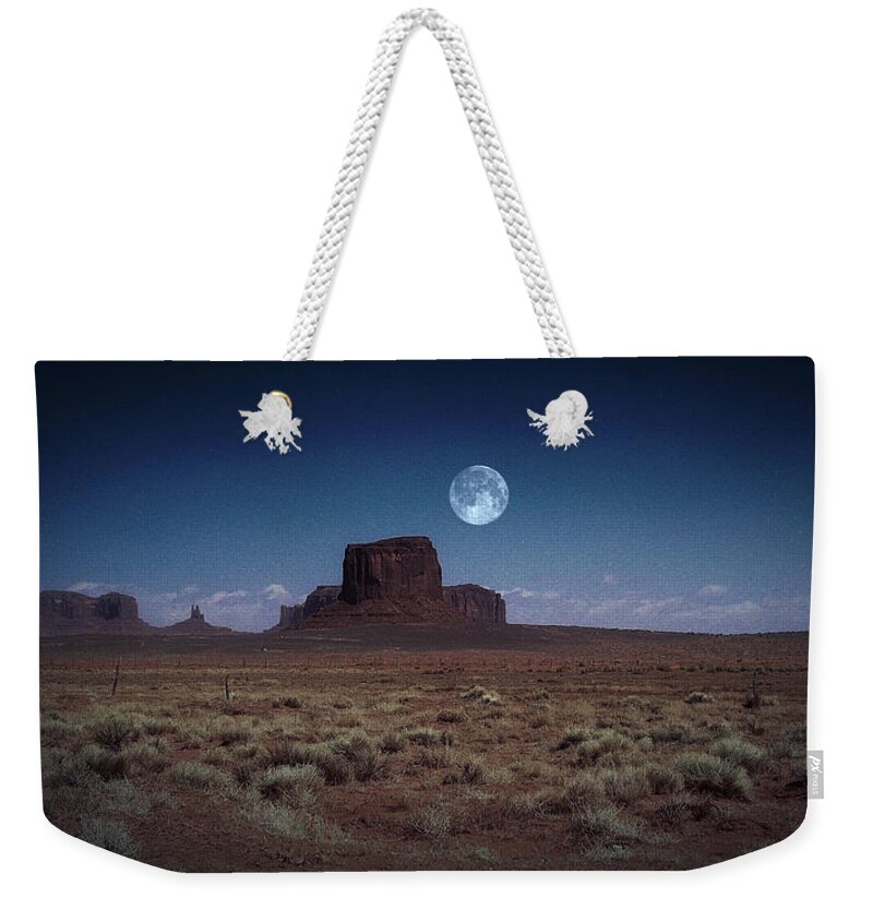 Monument Valley Weekender Tote Bag featuring the photograph Full Moon over Monument Valley by Barbara Zahno