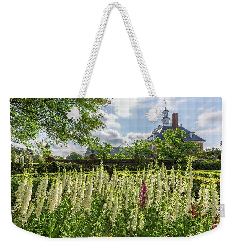 Colonial Williamsburg Weekender Tote Bag featuring the photograph Garden Flowers at the Governor's Palace by Rachel Morrison