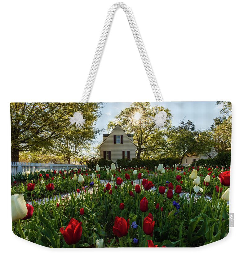Colonial Williamsburg Weekender Tote Bag featuring the photograph Garden in the Spring by Rachel Morrison