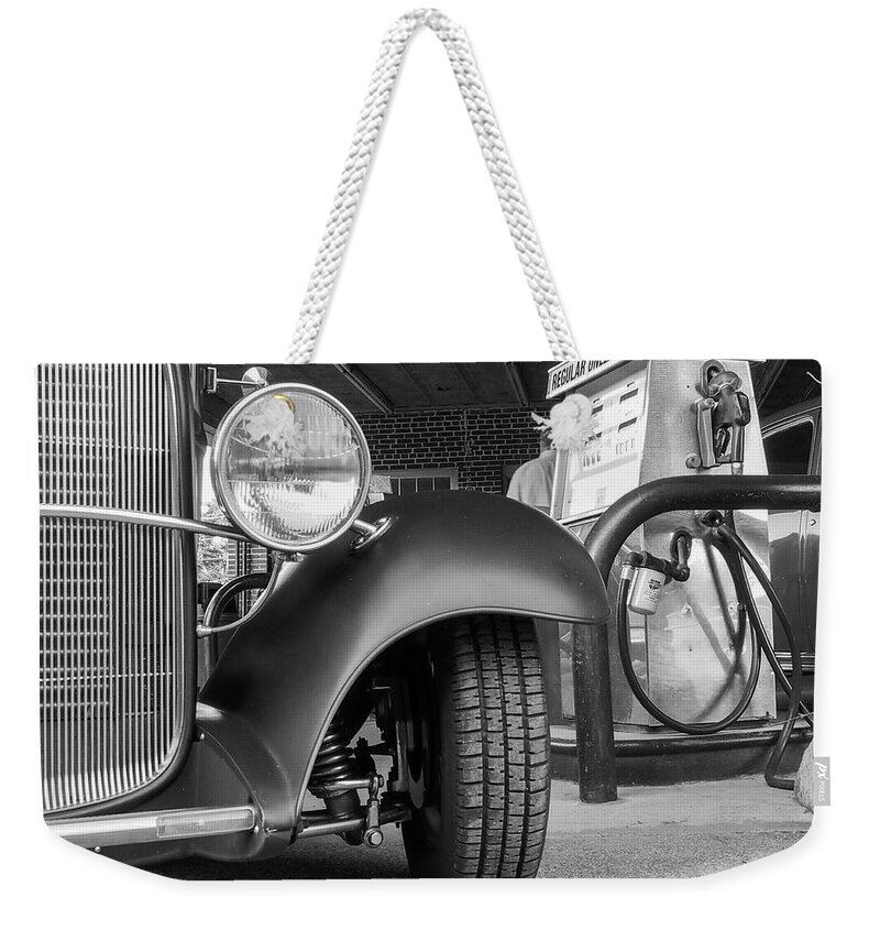 Car Weekender Tote Bag featuring the photograph Gassing Up the Old Buggy by James C Richardson