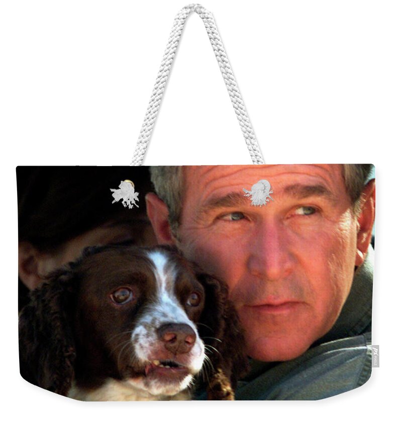 George W. Bush Weekender Tote Bag featuring the photograph George W. Bush and Dog by Rick Wilking