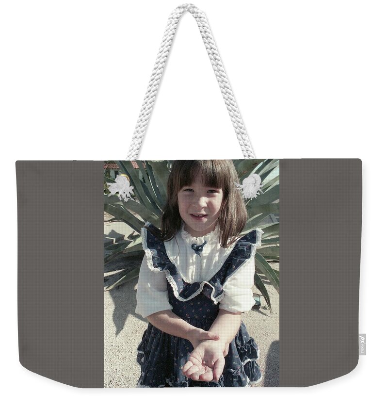 Tucson Weekender Tote Bag featuring the photograph Girl with Tooth and Cactus by Jeremy Butler