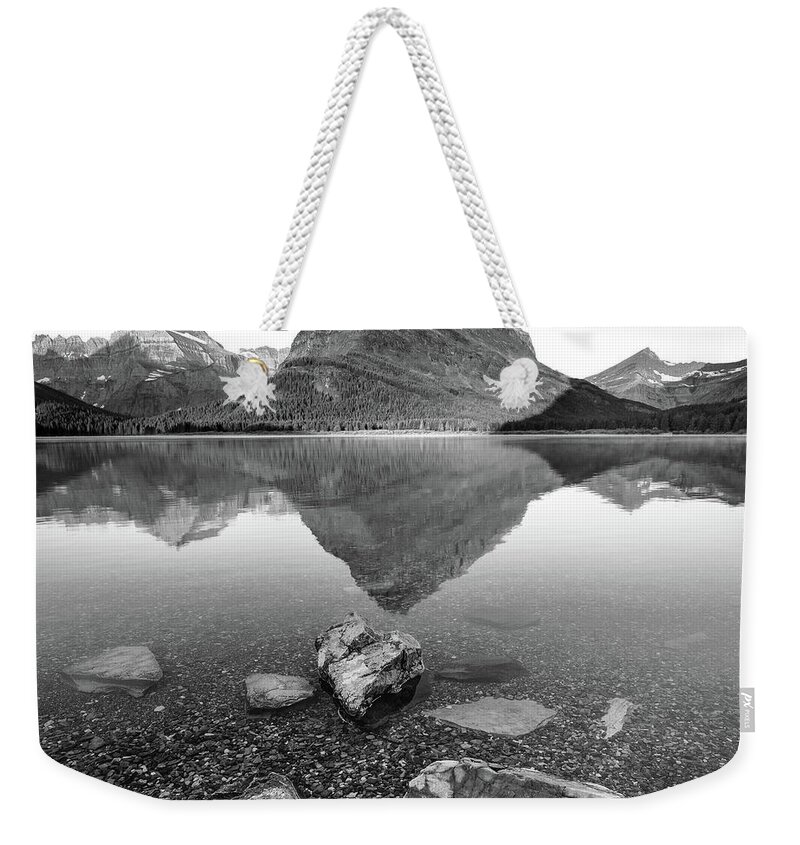Reflections Weekender Tote Bag featuring the photograph Black and white reflections at Glacier National Park by Robert Miller
