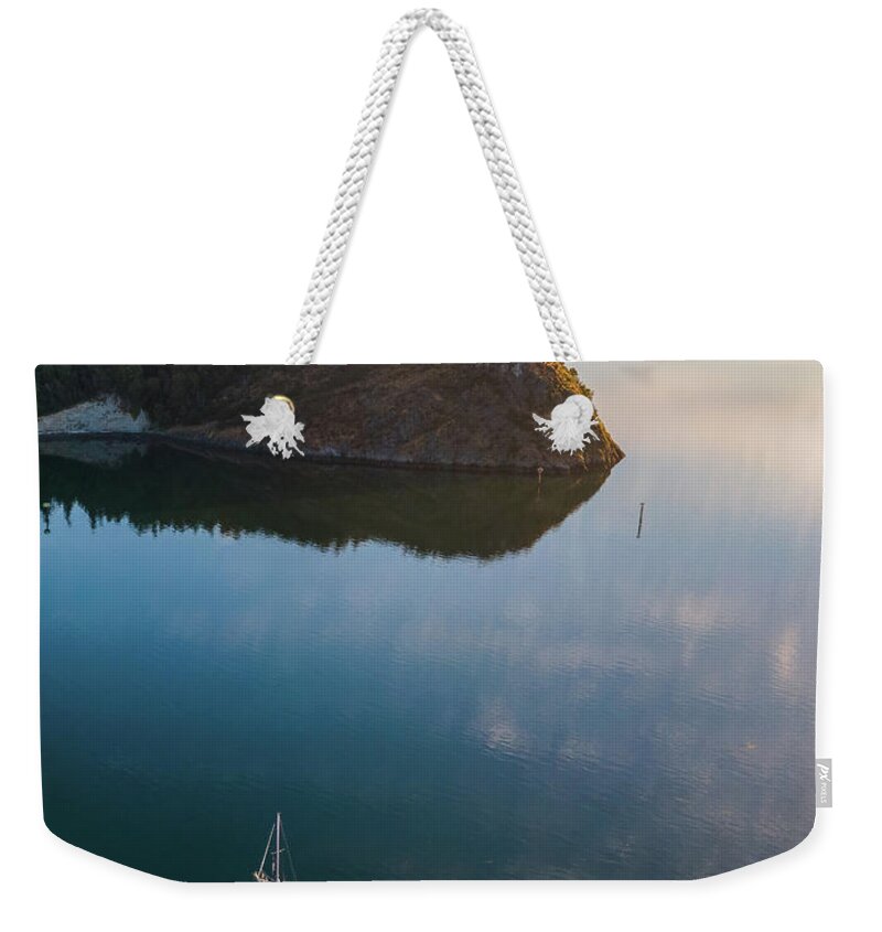 Sailboat Weekender Tote Bag featuring the photograph Glassy Calm by Michael Rauwolf