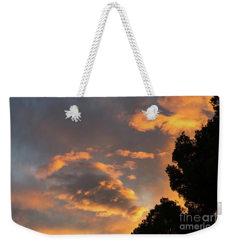 Clouds Weekender Tote Bag featuring the photograph Glowing sky by Adriana Mueller