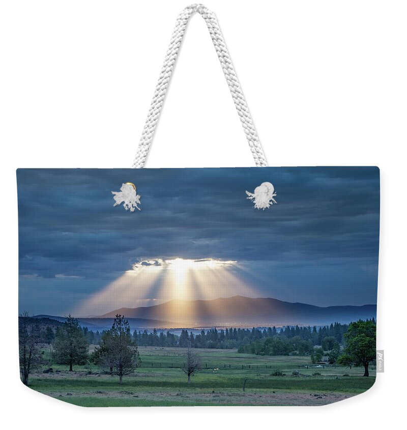 Crepuscular Weekender Tote Bag featuring the photograph God Rays by Randy Robbins