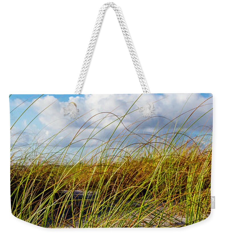 Clouds Weekender Tote Bag featuring the photograph Golden Dune Grasses II by Debra and Dave Vanderlaan