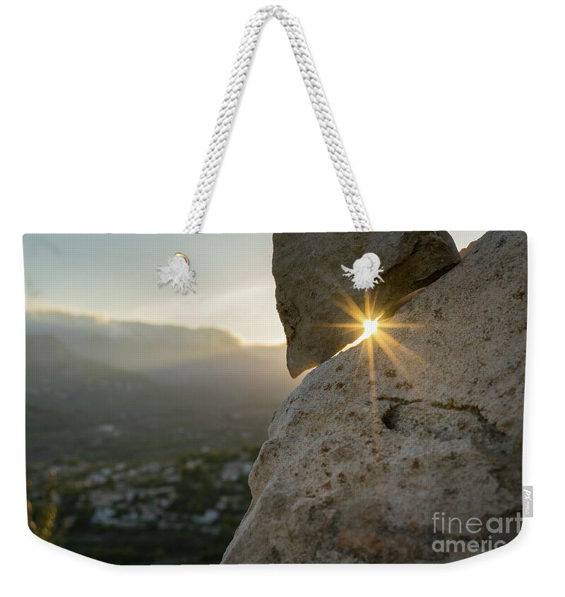 Mountains Weekender Tote Bag featuring the photograph Golden sunlight and rock at sunset by Adriana Mueller