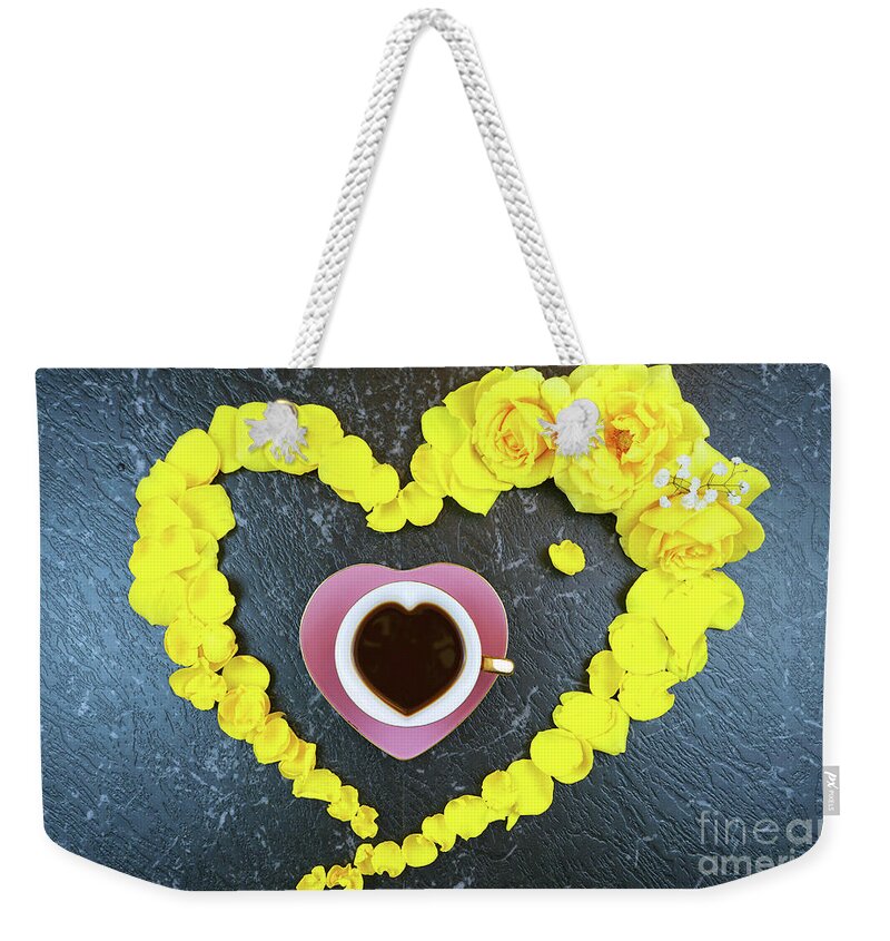 Yellow Weekender Tote Bag featuring the photograph Good morning concept with coffee cup in heart shaped fresh yellow roses. by Milleflore Images