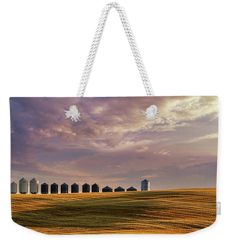 2020-09-30. Harvest. Fall. Colors Weekender Tote Bag featuring the photograph Grain Bins All In A Row by Phil And Karen Rispin