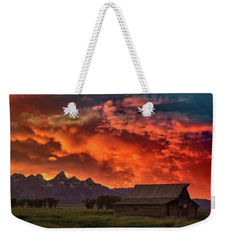 Tetons Weekender Tote Bag featuring the photograph Grand Sunset in the Tetons by Jon Glaser