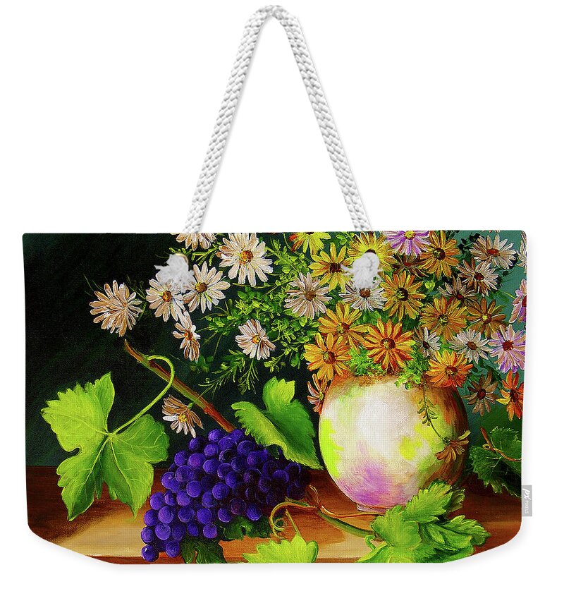 Grapes Weekender Tote Bag featuring the painting     Grapes on the Table and lots of Flowers in the Vase     by Dominica Alcantara