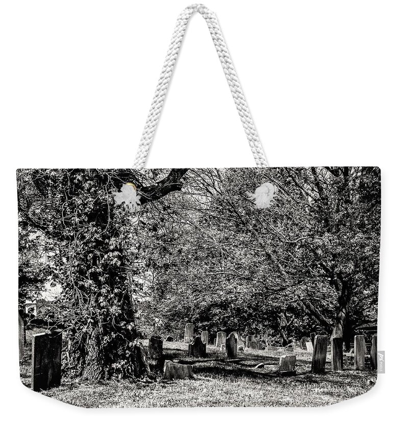 Grave Yard Tombstones Trees B&w Weekender Tote Bag featuring the photograph Grave Yard1 by John Linnemeyer