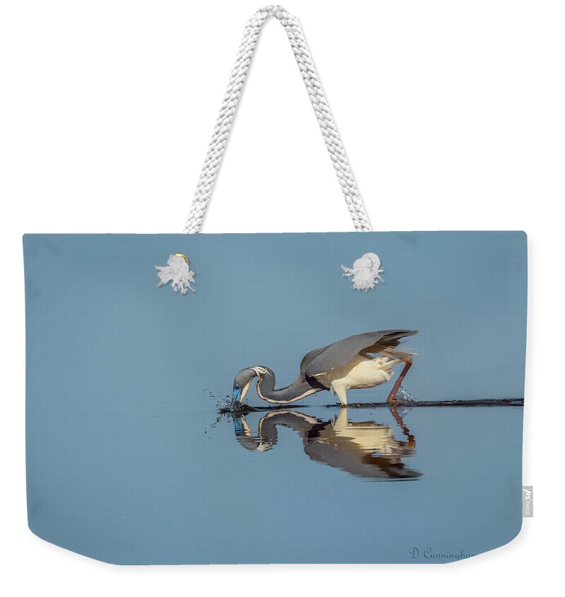 Great Blue Heron Weekender Tote Bag featuring the photograph Great Blue Heron Getting Breakfast by Dorothy Cunningham