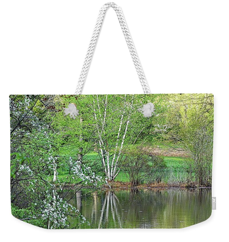Spring Weekender Tote Bag featuring the photograph Green Spring by Lyuba Filatova