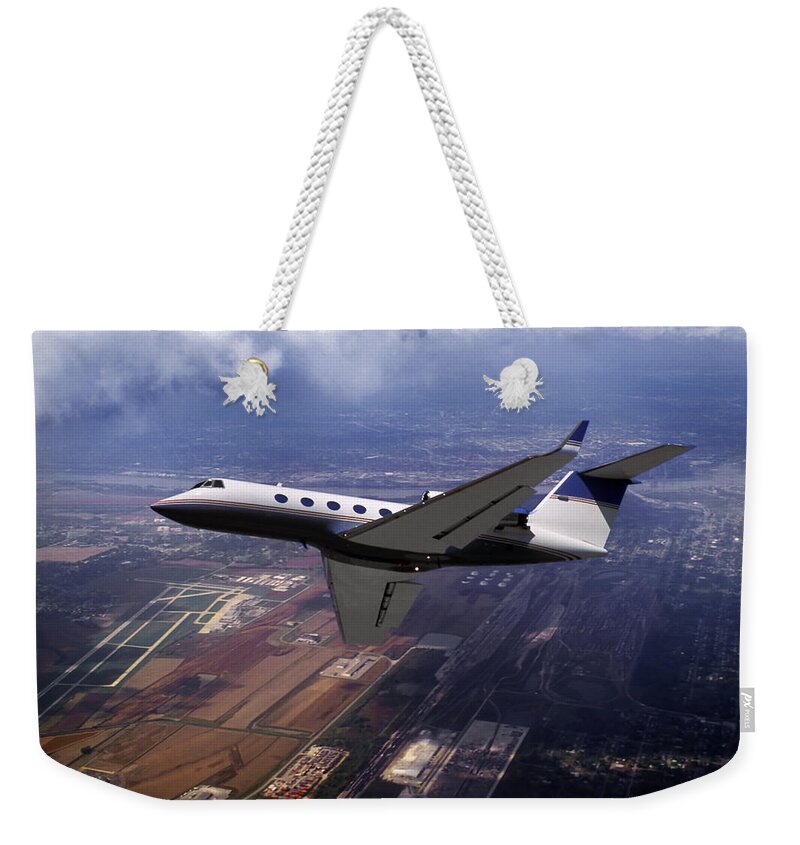 Gulfstream 2 Business Jet Weekender Tote Bag featuring the mixed media Gulfstream Corporate Jet by Erik Simonsen