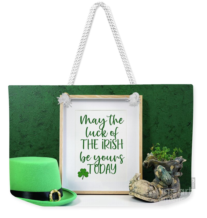 St Patrick Weekender Tote Bag featuring the photograph Happy St Patrick's Day wood border picture frame. by Milleflore Images