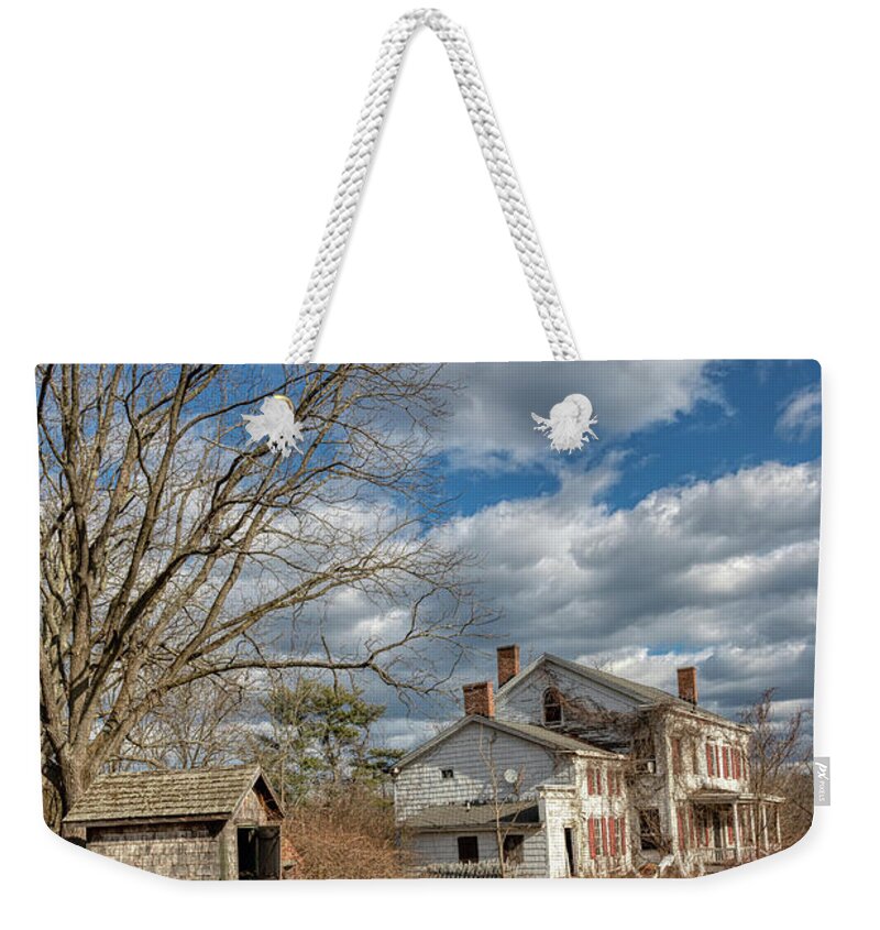 White Fence Weekender Tote Bag featuring the photograph Haunted Pump House by David Letts