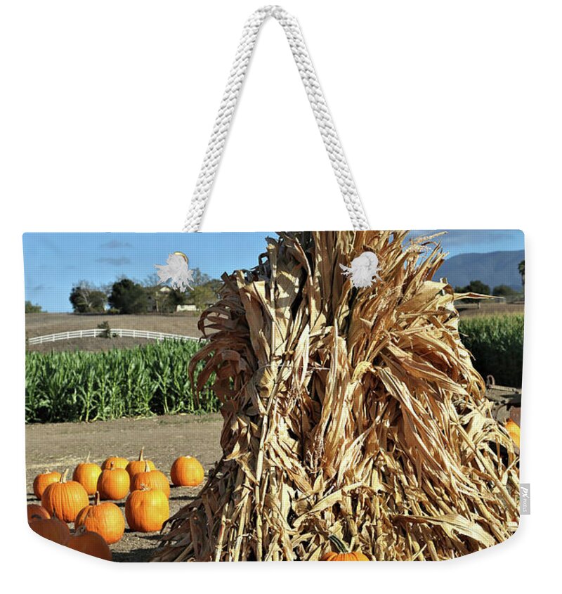 Hay Stack Weekender Tote Bag featuring the photograph Hay Stack and Pumpkins by Vivian Krug Cotton