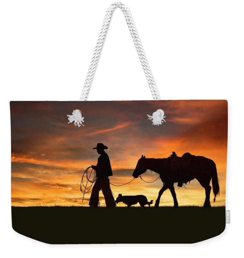 Cowboy Weekender Tote Bag featuring the digital art Heading Home by Nicole Wilde