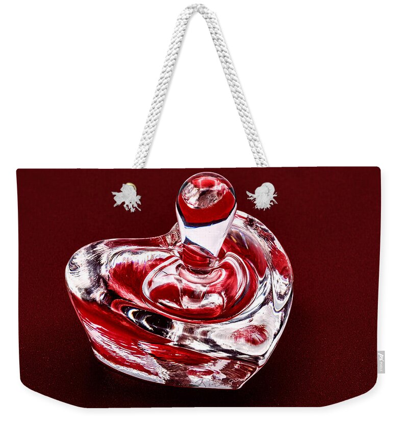 Bottle Weekender Tote Bag featuring the photograph Heart Shaped Glass Perfume Bottle - Red by Stuart Litoff