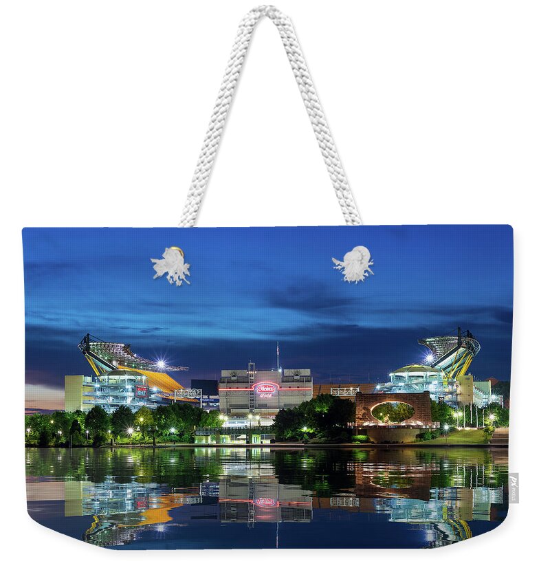 Heinz Field Weekender Tote Bag featuring the photograph Heinz Field sports arena at night in reflection by Steven Heap