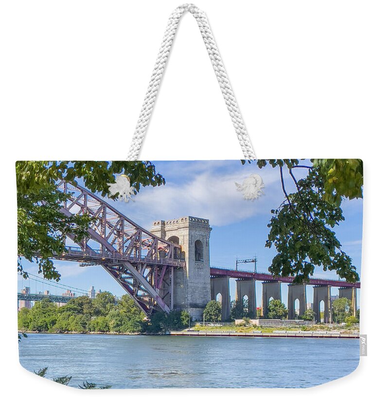 Hell Gate Bridge Weekender Tote Bag featuring the photograph Hell Gate beneath the trees by Cate Franklyn