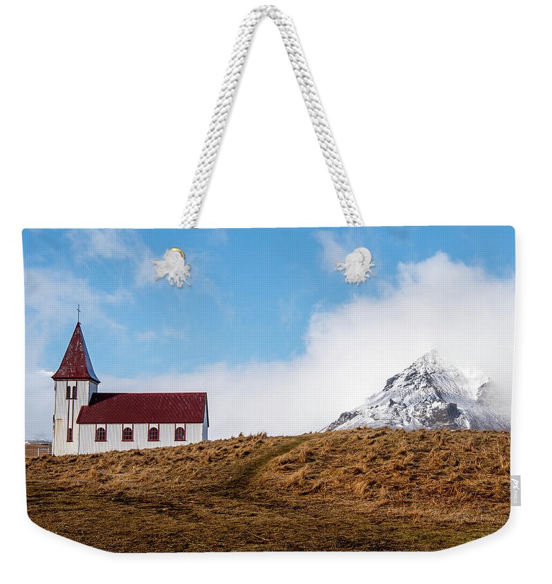 Iceland Weekender Tote Bag featuring the photograph Hellnar church in Snaefellsnes peninsula of Western Iceland. by Michalakis Ppalis