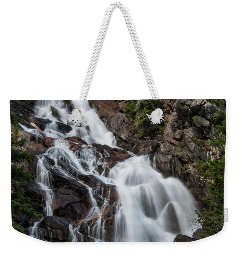 Grand Teton National Park Weekender Tote Bag featuring the photograph Hidden Falls by Melissa Southern