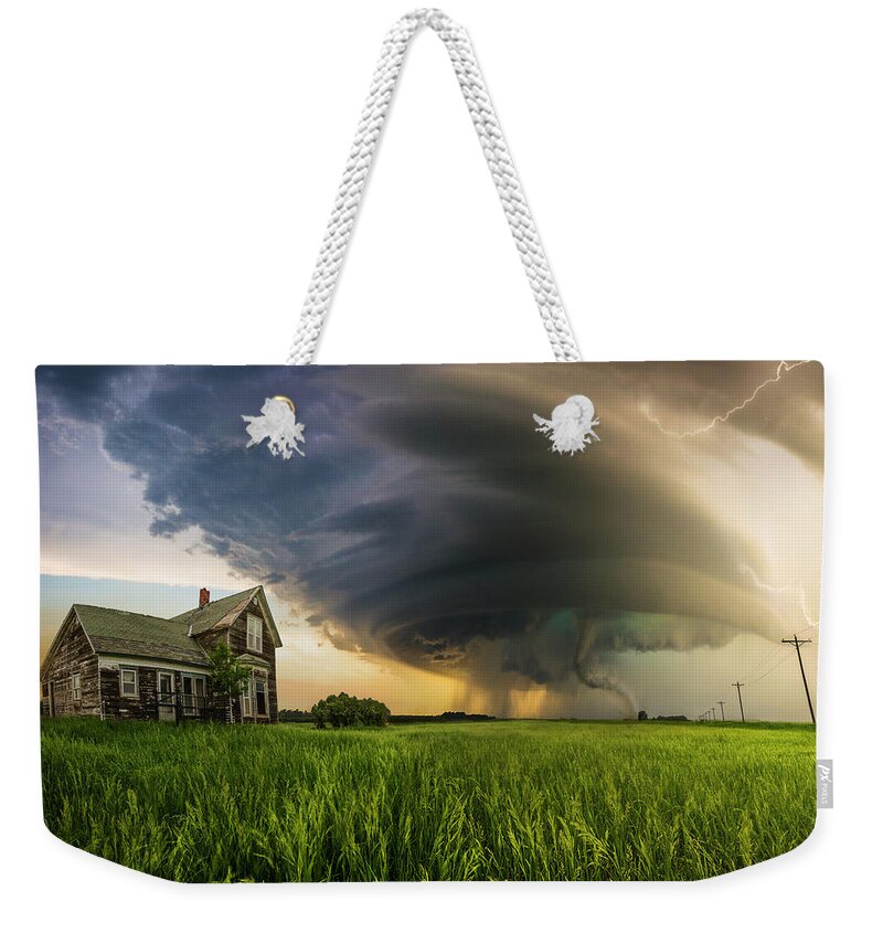 Severe Weather Weekender Tote Bag featuring the photograph Hold On by Aaron J Groen