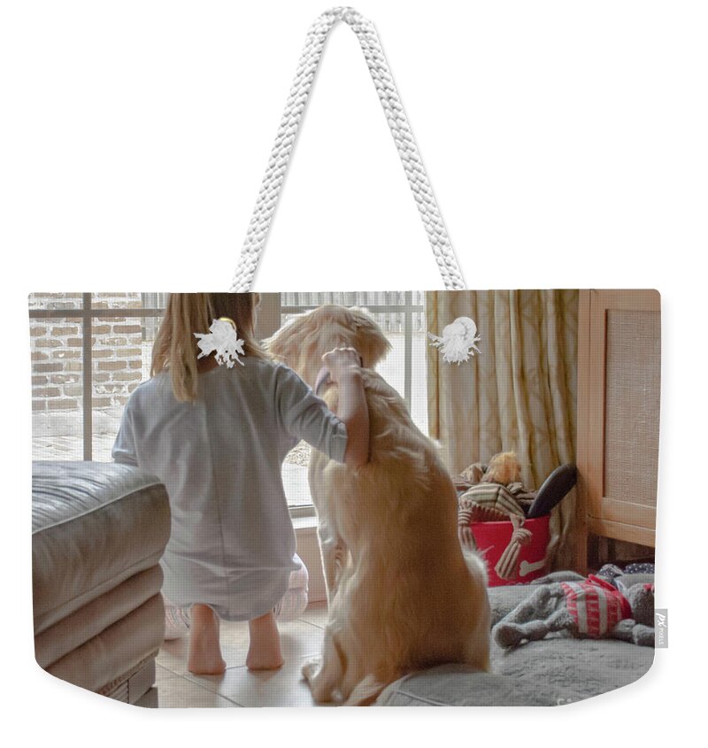 People Weekender Tote Bag featuring the photograph Holding Dixie by Barry Bohn