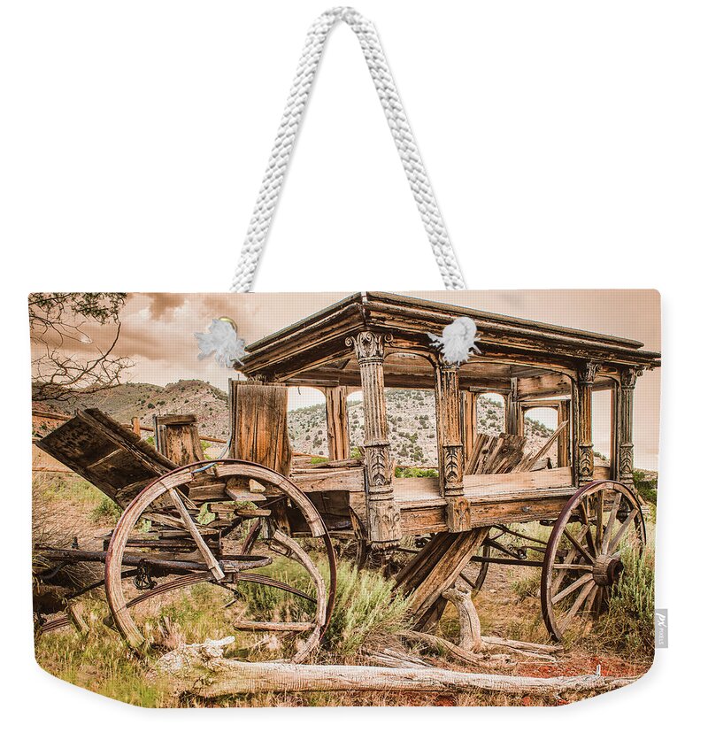 Horsedrawn Weekender Tote Bag featuring the photograph Horse Drawn Hearse in Virginia City by Ron Long Ltd Photography