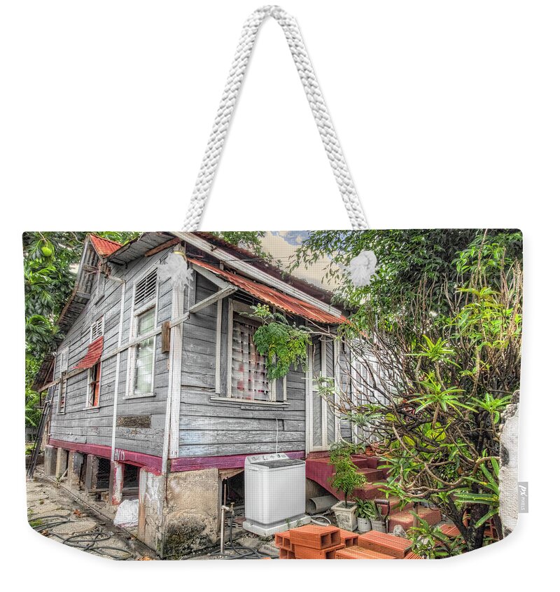 Trinidad Weekender Tote Bag featuring the photograph House Behind The Trees by Nadia Sanowar