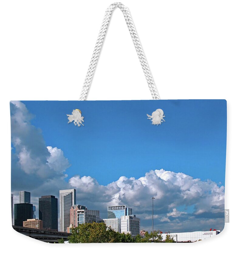 Clouds Weekender Tote Bag featuring the photograph Houston Skyline Southeast by Connie Fox