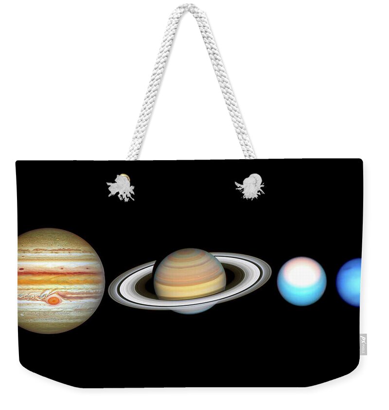 Hubble Weekender Tote Bag featuring the photograph Hubble Takes a Grand Tour of the Solar System by Eric Glaser