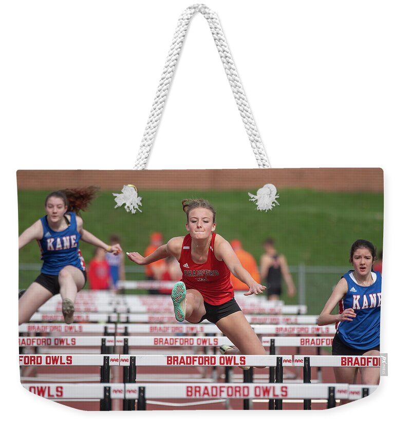 Alexia Weekender Tote Bag featuring the photograph Hurdler by Wade Aiken