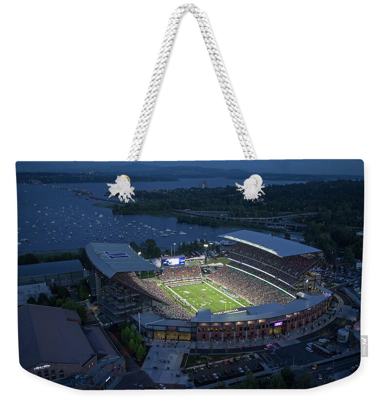 Husky Stadium Weekender Tote Bag featuring the photograph Husky Stadium and the Mountain by Max Waugh
