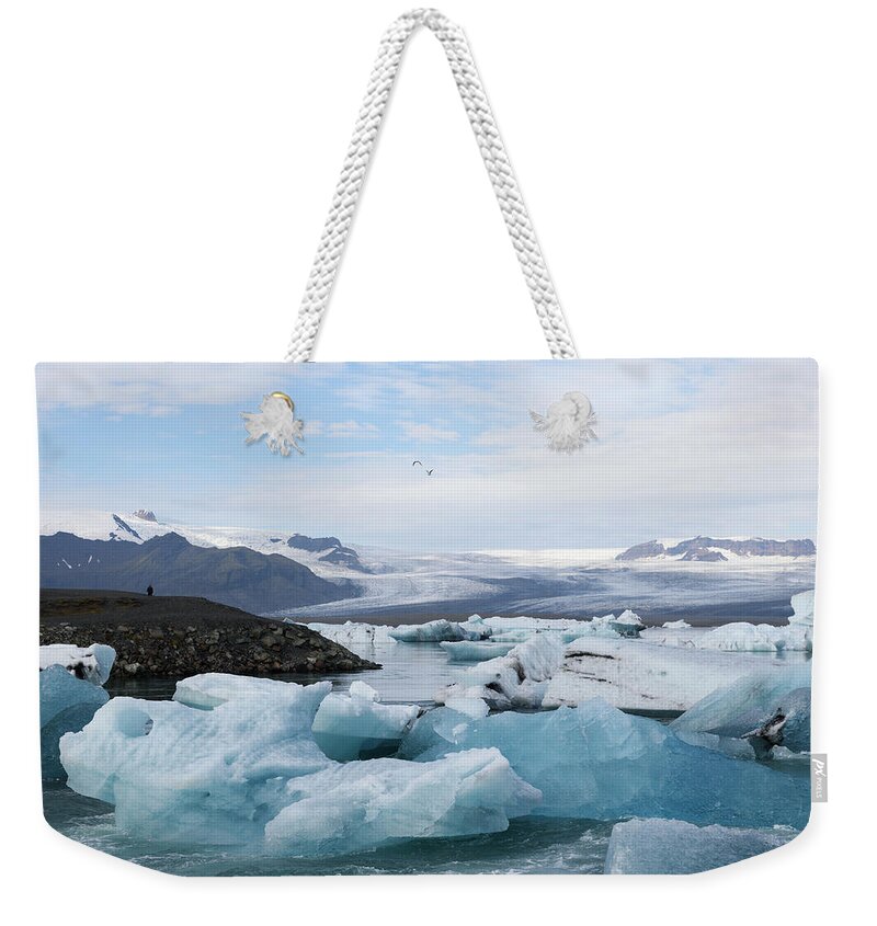 Iceland Weekender Tote Bag featuring the photograph Icebergs at Jokulsarlon glacier lagoon by RicardMN Photography