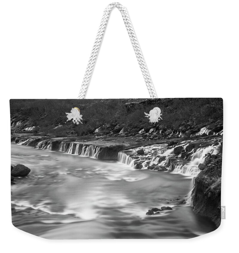 Iceland Weekender Tote Bag featuring the photograph Iceland Hraunfosser Waterfall Reykholt Smooth River Black and White by Toby McGuire