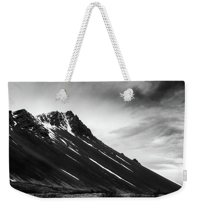 Iceland Weekender Tote Bag featuring the photograph Icelandic volcano mountain in winter in Iceland by Michalakis Ppalis