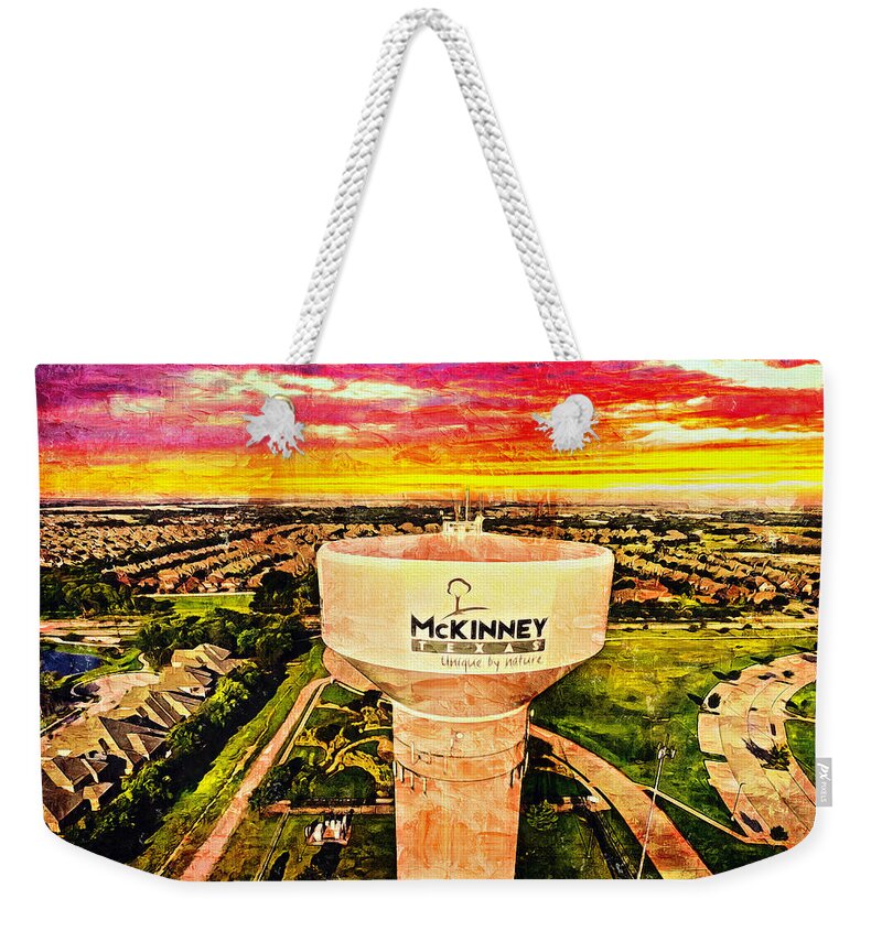 Water Tower Weekender Tote Bag featuring the digital art Iconic water tower in western McKinney, Texas, at sunset by Nicko Prints